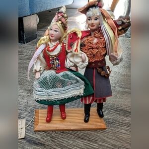 Colorful Folk Art Doll Pair with Red and Green Details